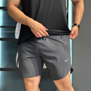 شلوارک ورزشی مردانه پارچه ایرو (Aero) – مدل جیم زیپ (Gym Zip)